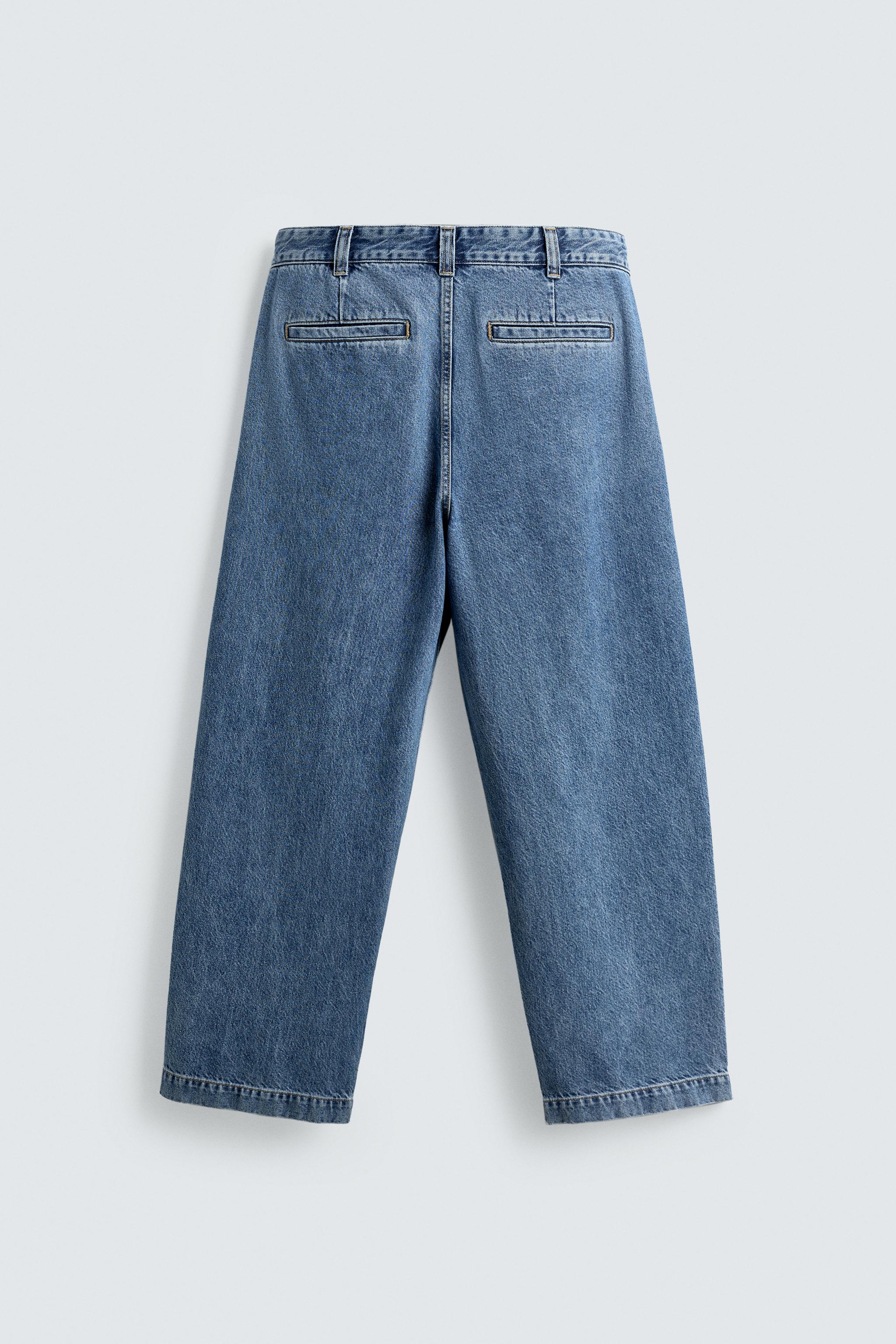 PLEATED WIDE FIT JEANS